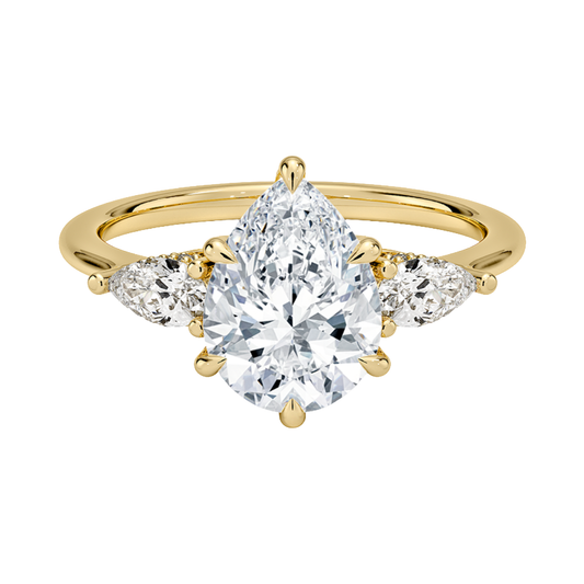 1 TO 5 Ct Adorned Opera Three Stone Pear Lab Grown Diamond Ring with Side Accent Diamonds – 10K/14K/18K Gold | Pooja Diamond | IGI Certified Lab Diamond