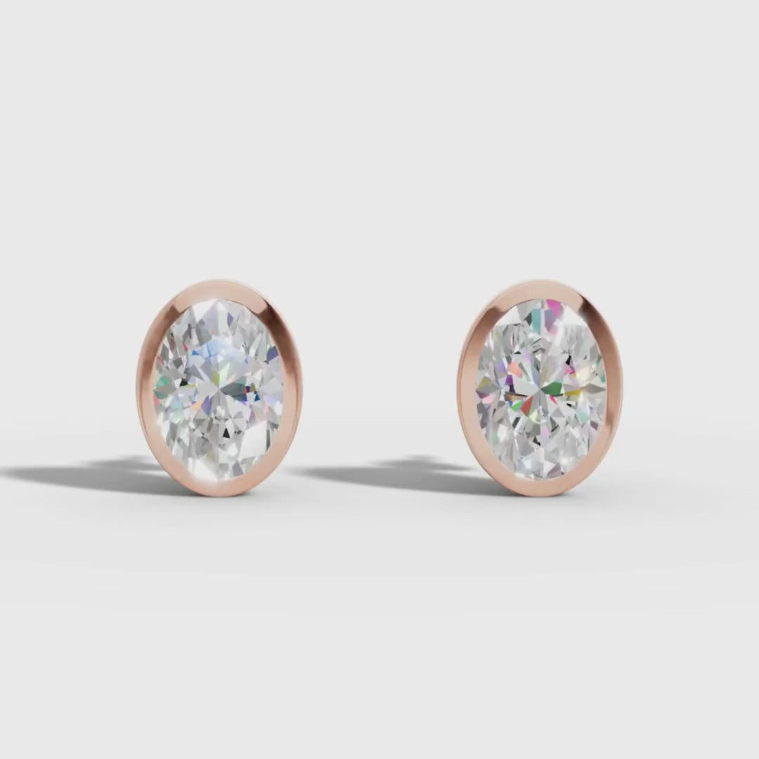 Oval Cut Lab Grown Diamond Stud Earrings in Gold